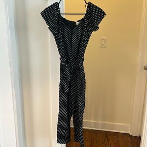 Chic polka dot jumpsuit with waist tie